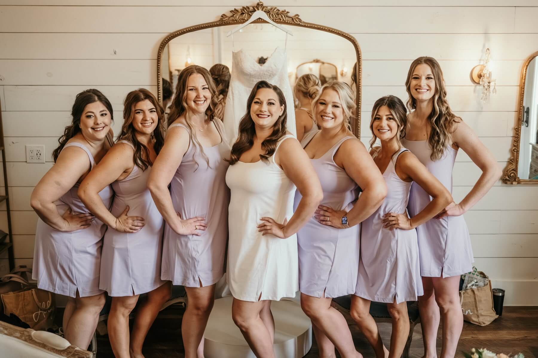 Bride with bridesmaids in getting ready dresses