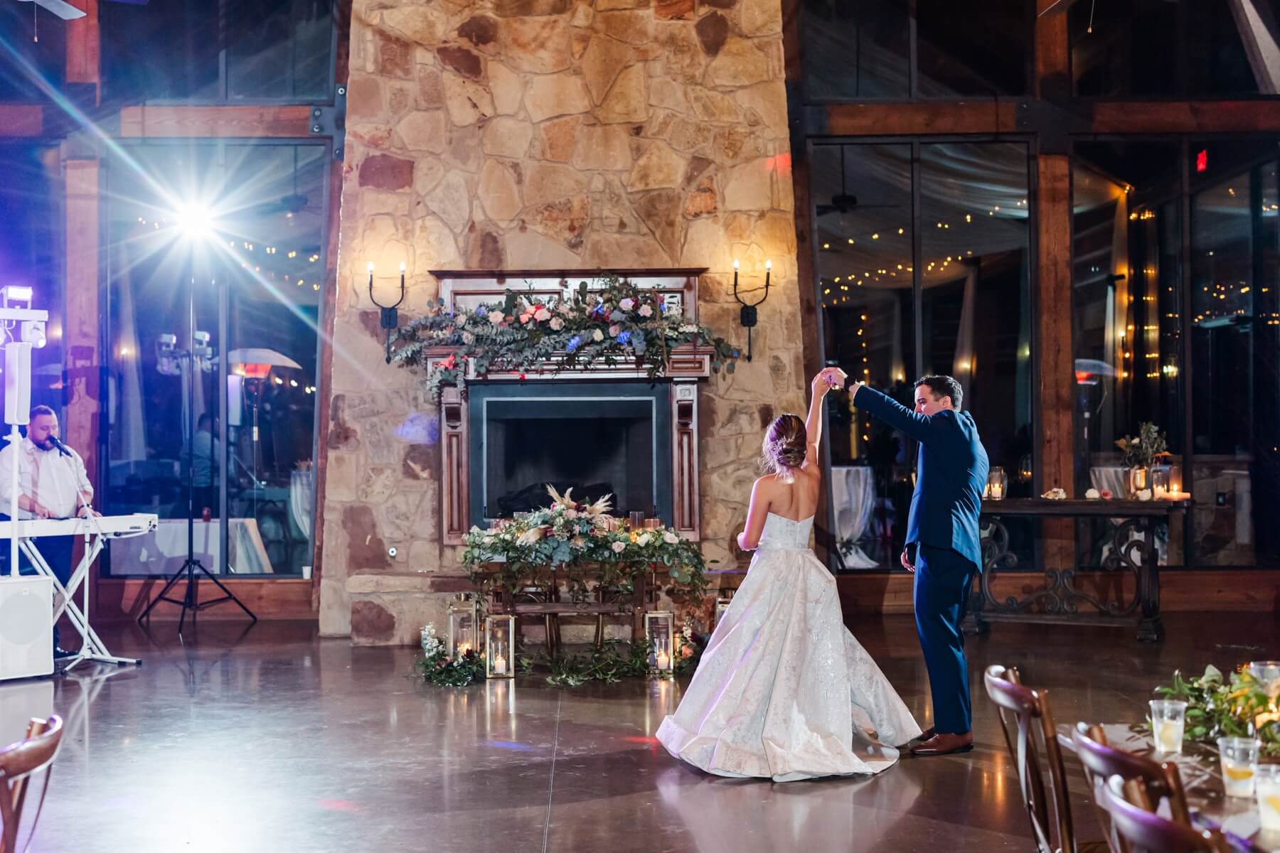 Groom spinning bride during last dance at The Springs in Denton