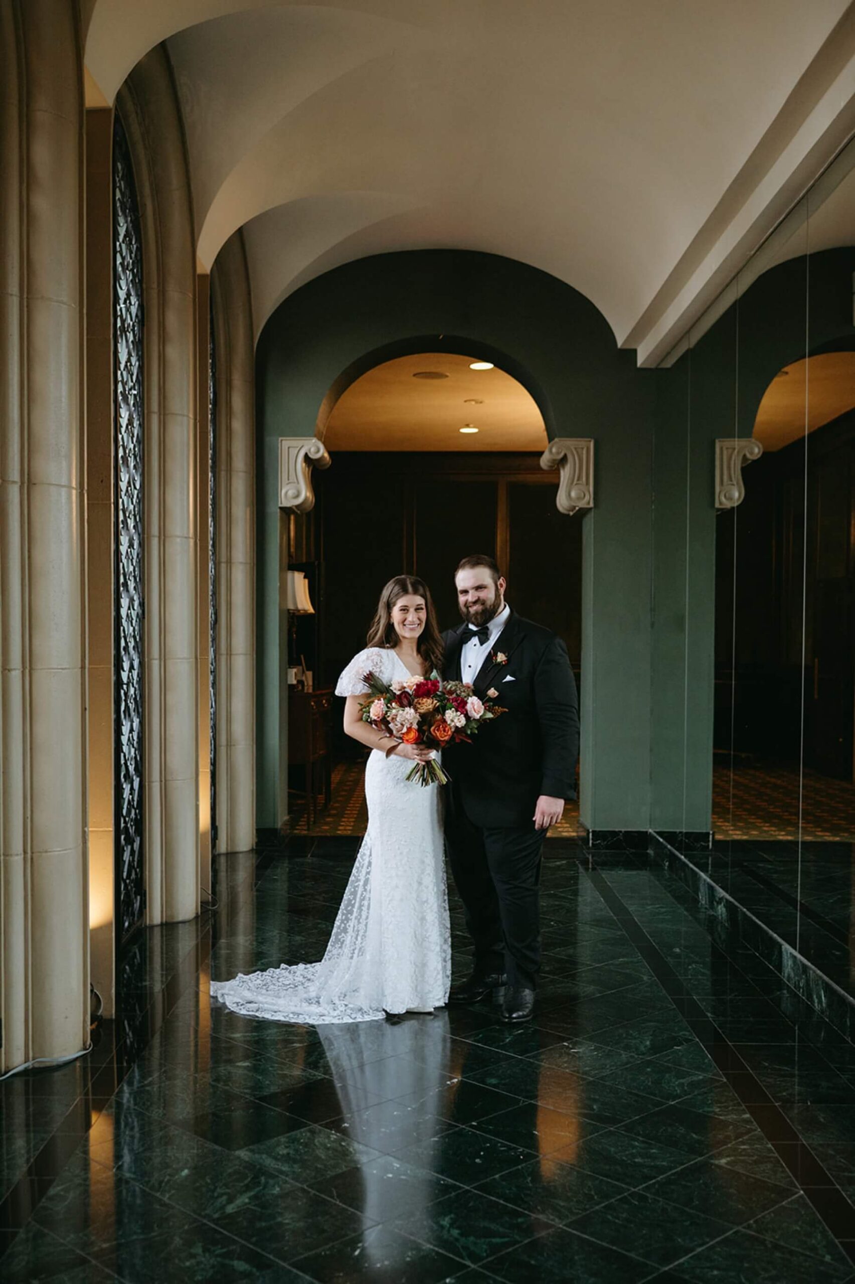 Bride and groom in hall of the Fort Worth Club