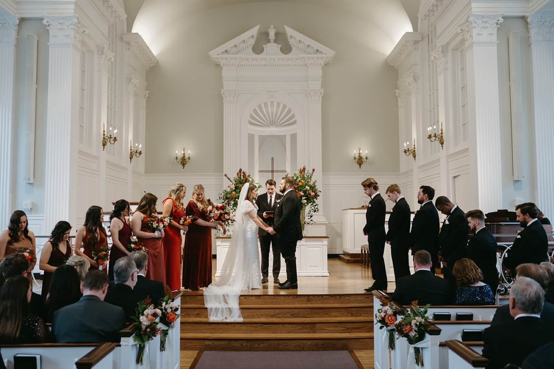 Bride and groom at altar at Robert Carr Chapel