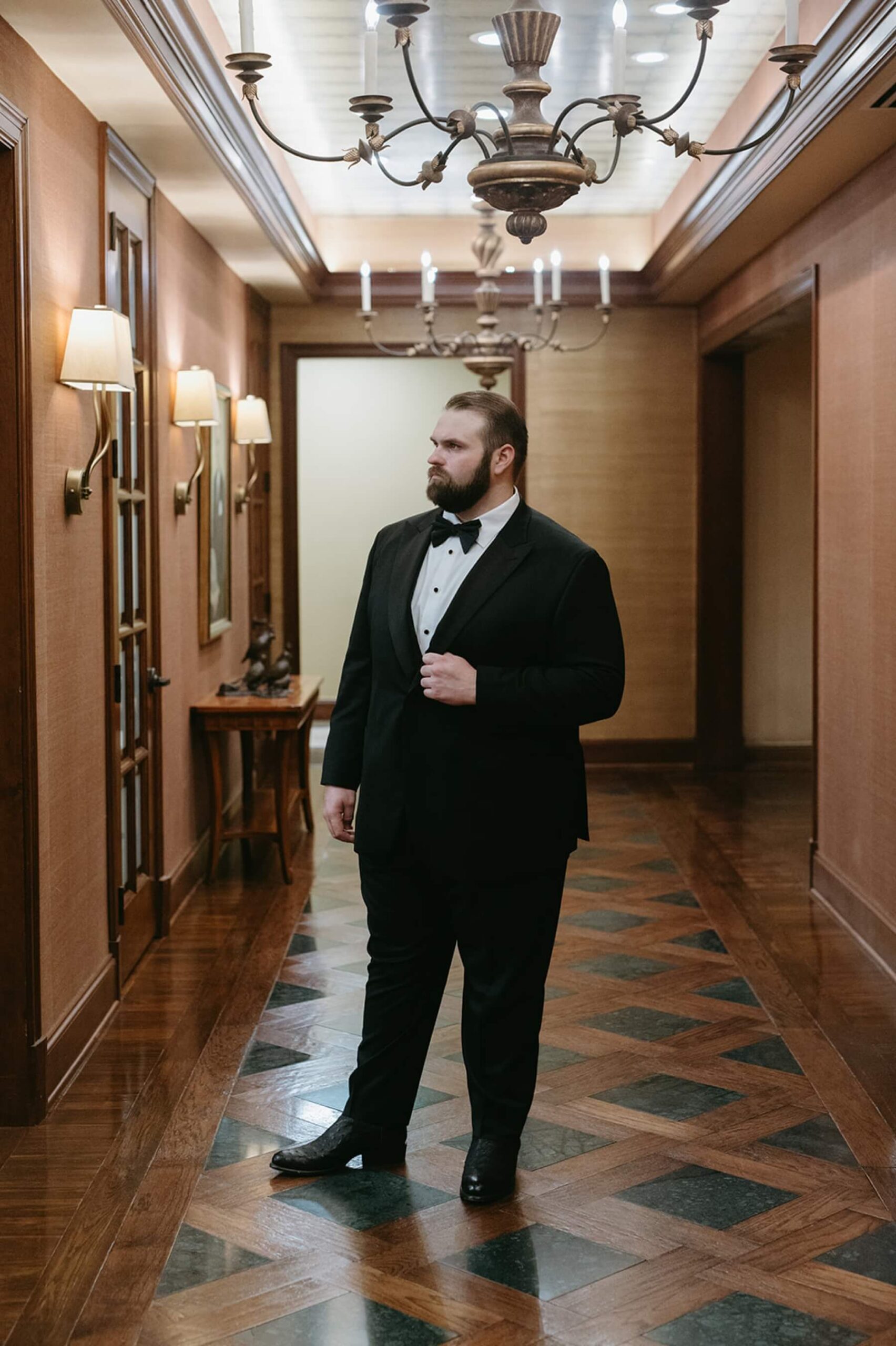 Groom in hall at the Fort Worth Club