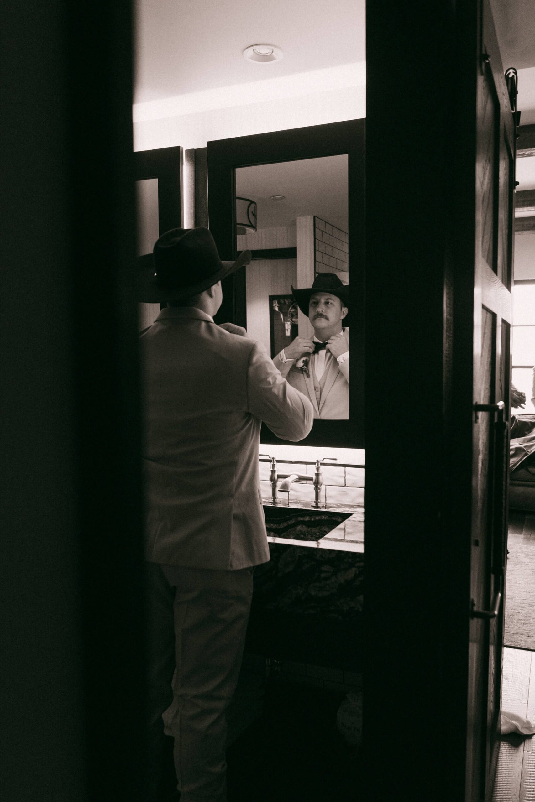 Groom getting ready before Fort Worth wedding